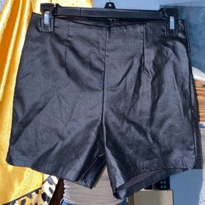 Black leather shorts w/ zipper in the back!